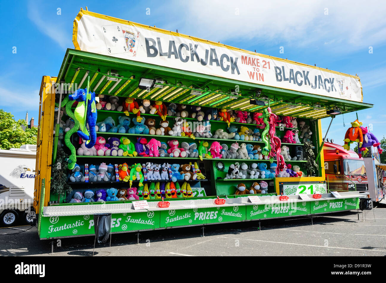 'Blackjack' fairground stall offering cuddly toys as prizes for having tickets totalling 21. Stock Photo