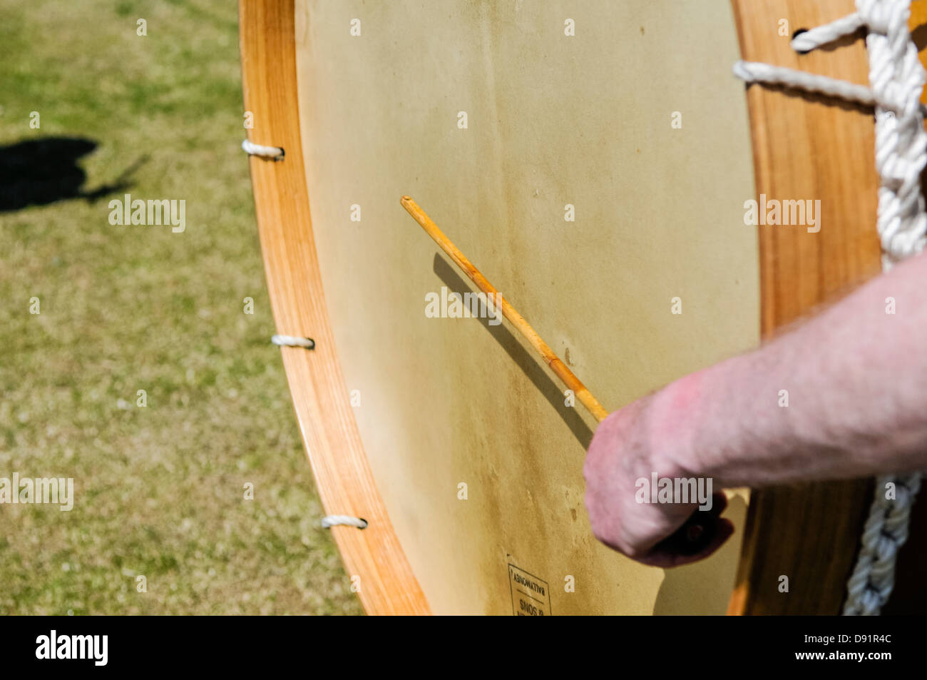 A man plays a traditional Irish Lambeg drum, commonly associated with Ulster Protestants Stock Photo