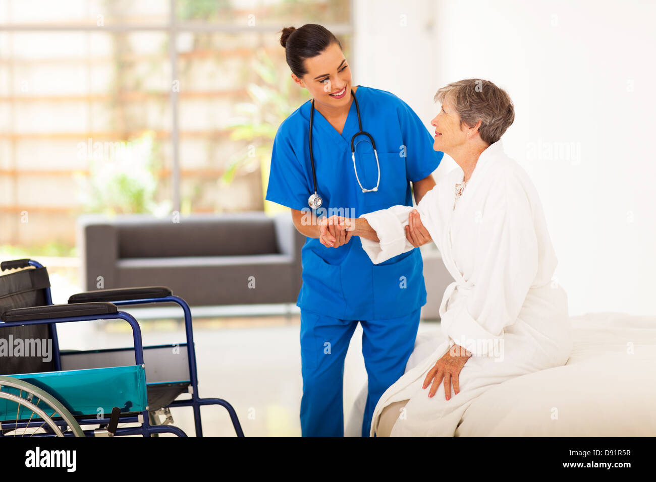 Young care worker elderly hi-res stock photography and images - Alamy