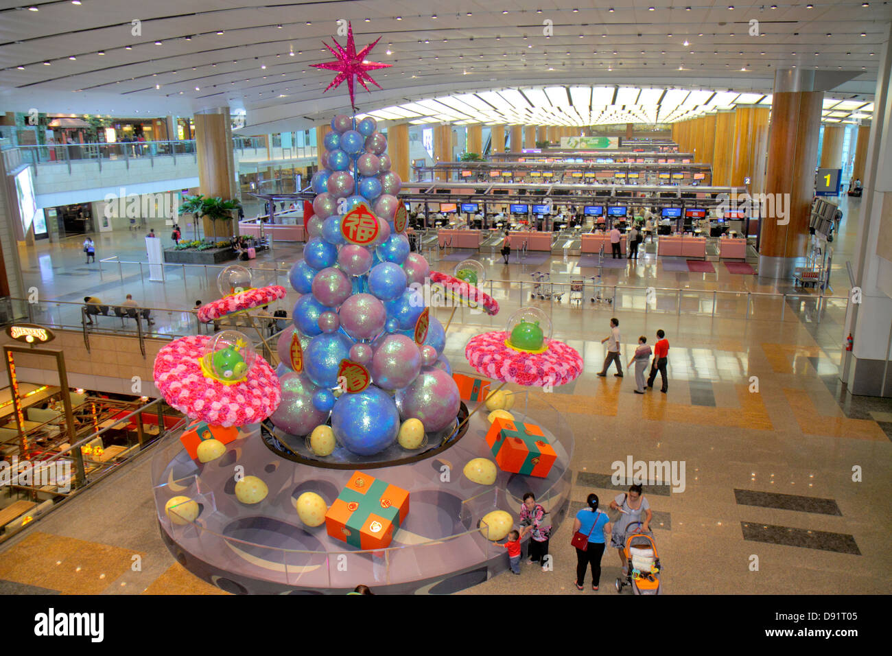 Singapore Changi International Airport,SIN,terminal,check-in counter,ticketing,ticket,interior inside,sculpture,art,interior inside,Sing130206069 Stock Photo
