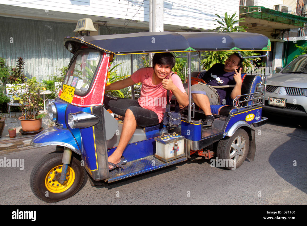 Bangkok Thailand,Thai,Pathum Wan,Soi Kasemsan 1,Rama 1 Road,Asian man men male,driver,passenger passengers rider riders,taxi,auto rickshaw,tuk-tuk,sam Stock Photo
