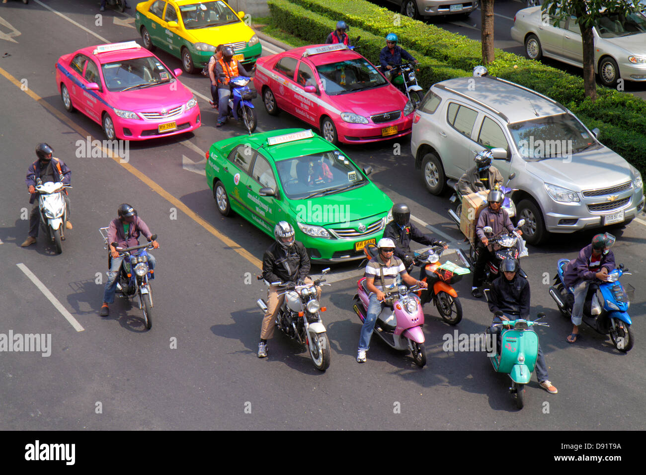 Bangkok Thailand,Thai,Pathum Wan,Phaya Thai Road,traffic,taxi taxis,cab,cabs,motorcycles,motor scooters,Skywalk,view,overhead,aerial overhead view fro Stock Photo