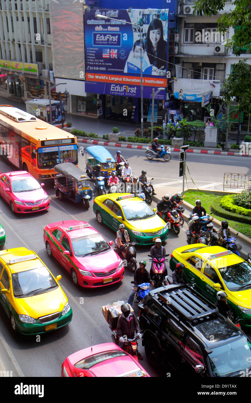 Bangkok Thailand,Thai,Pathum Wan,Rama 1 Road,traffic,taxi taxis,cab,cabs,motorcycles,motor scooters,bus,coach,auto rickshaw,tuk-tuk,sam-lor,Skywalk,vi Stock Photo