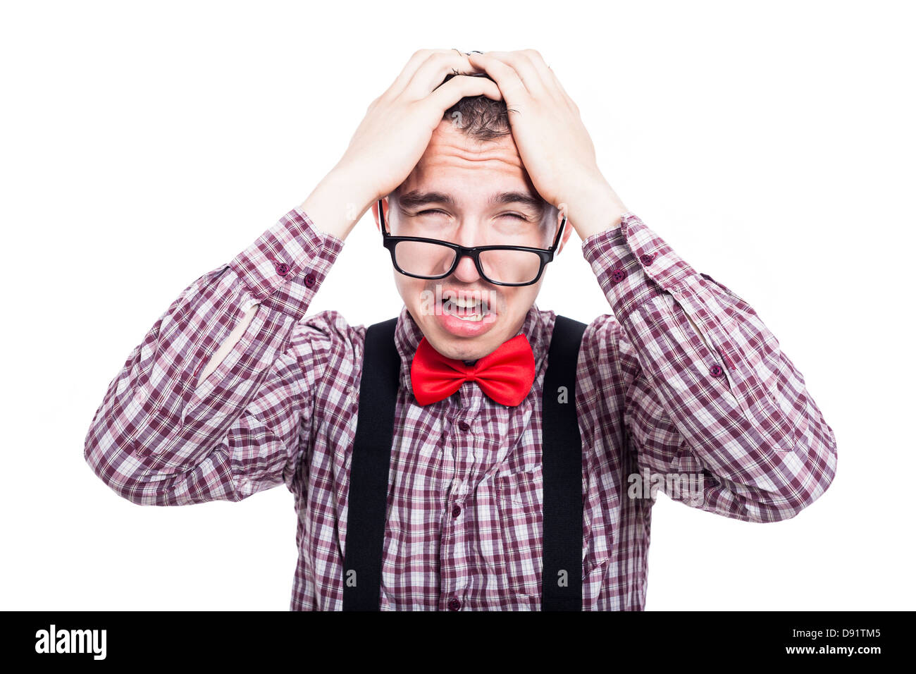 Young unhappy nerd man, isolated on white background Stock Photo