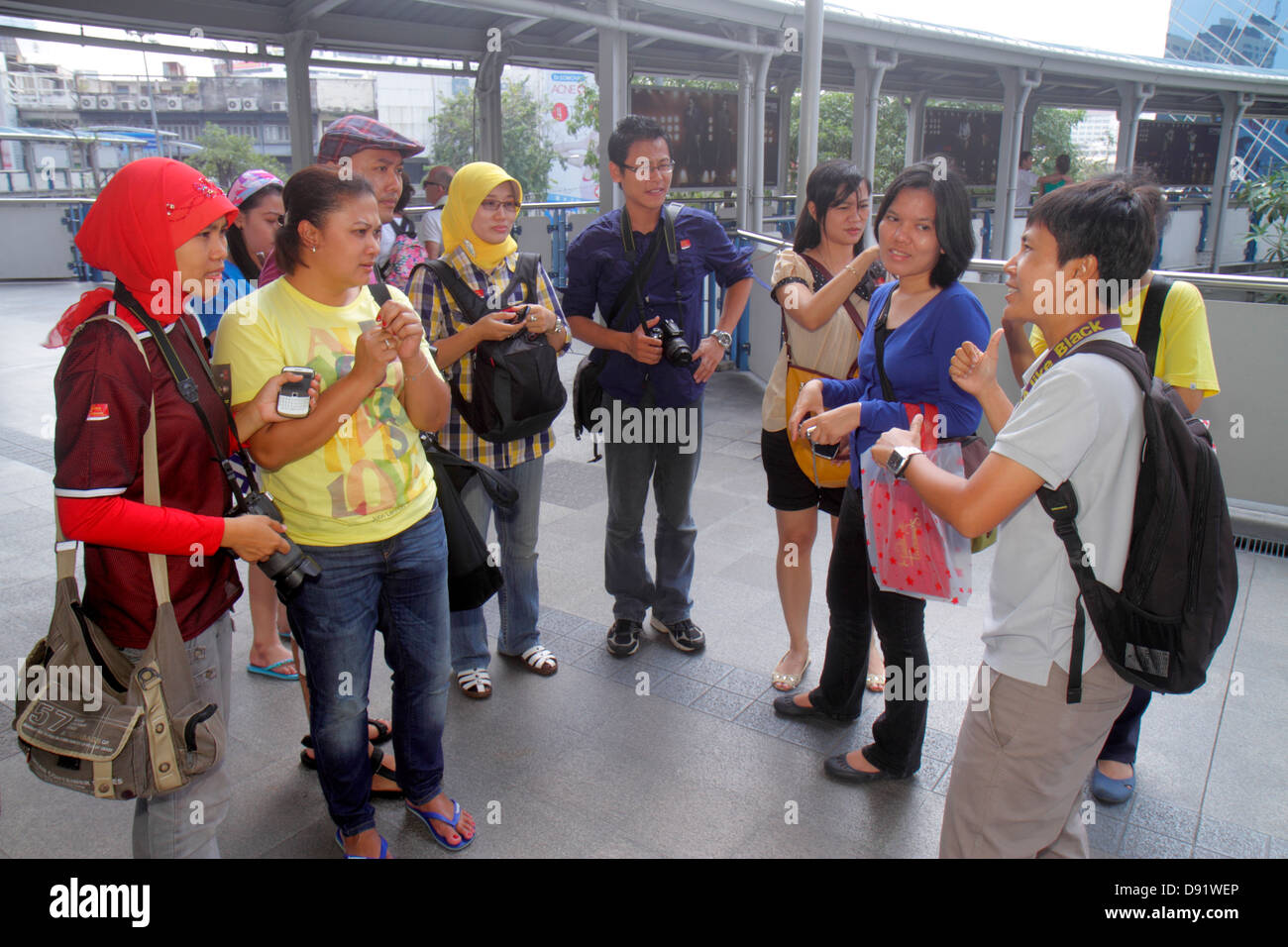 Bangkok Thailand,Thai,Pathum Wan,Phaya Thai Road,Skywalk,Asian Asians ethnic immigrant immigrants minority,adult adults woman women female lady,man me Stock Photo