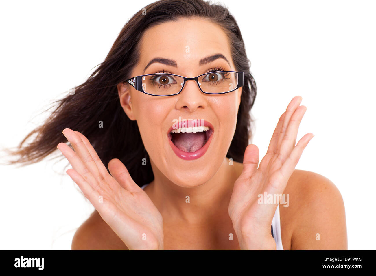 young woman looking surprised isolated on white Stock Photo