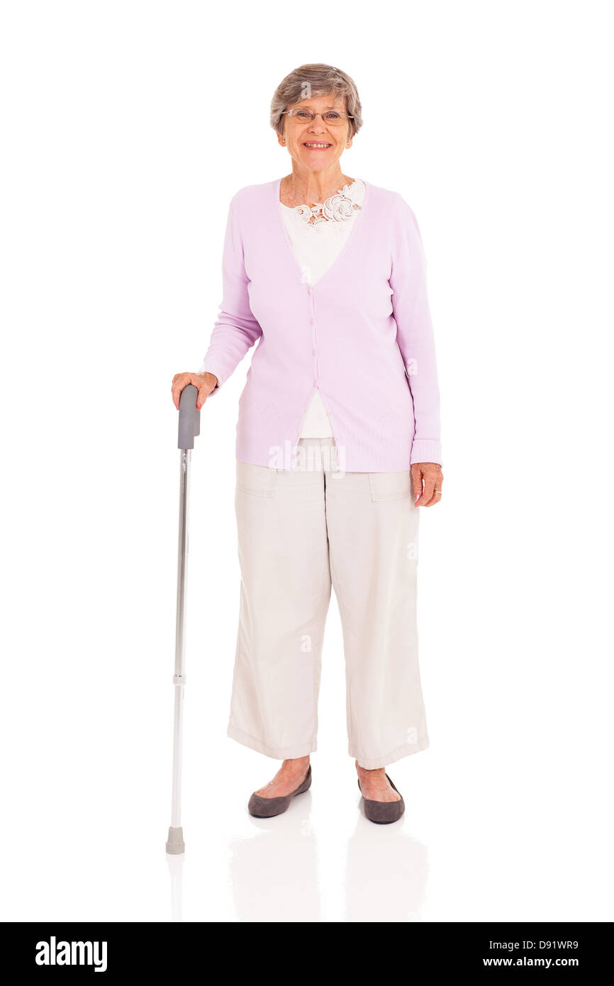 senior woman with walking cane isolated on white background Stock Photo