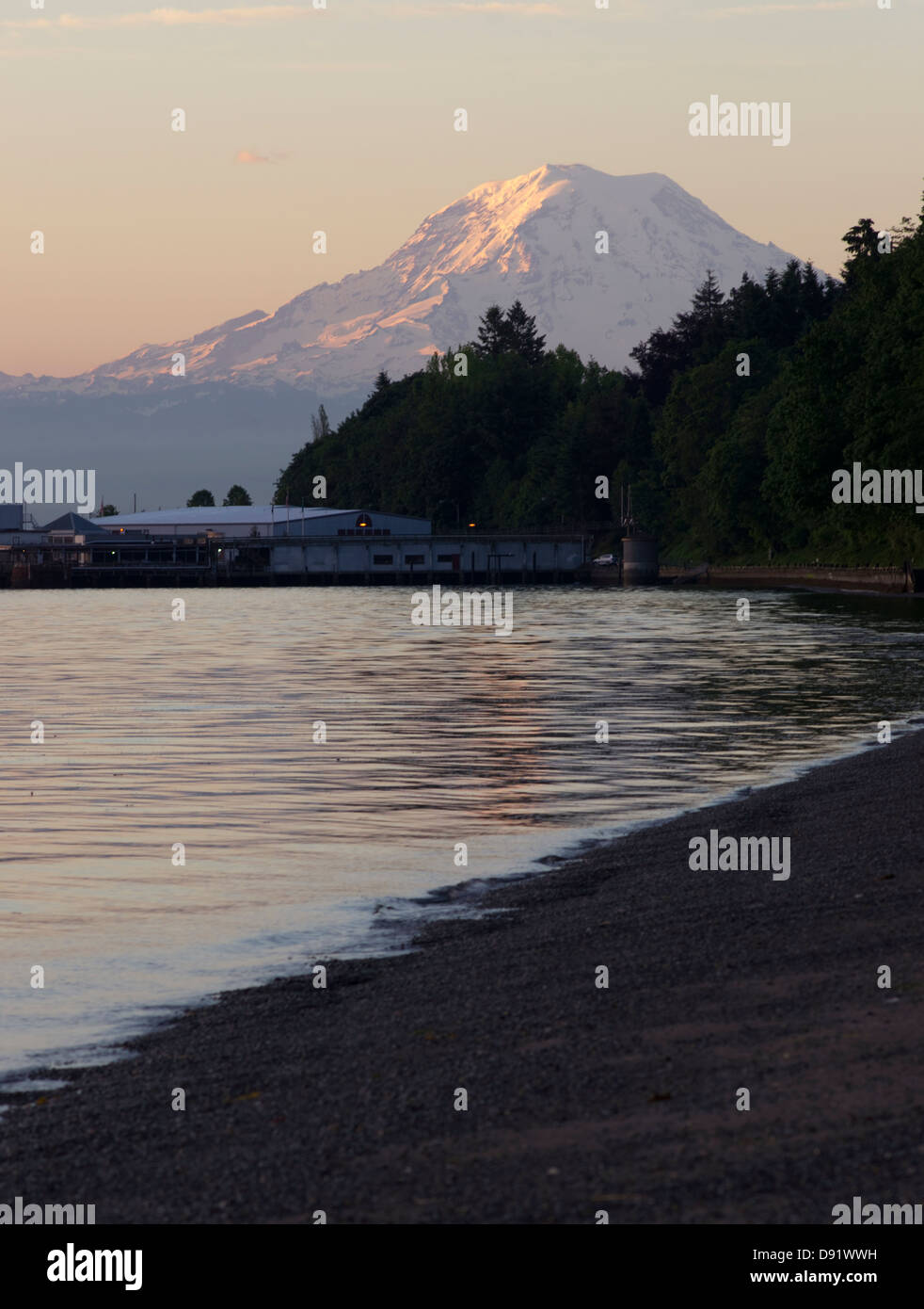 Mt. Rainier looms large over north Tacoma and Point Defiance waterfront Stock Photo