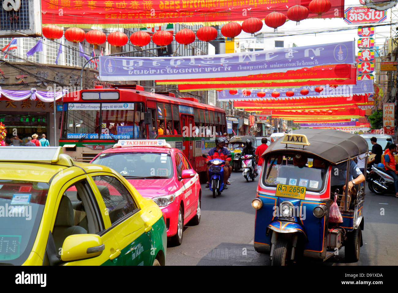 Bangkok Thailand,Thai,Samphanthawong,Chinatown,Yaowarat Road,traffic,taxi,auto rickshaw,tuk-tuk,sam-lor,bus,coach,taxis,cab,cabs,bus,coach,motorcycle, Stock Photo