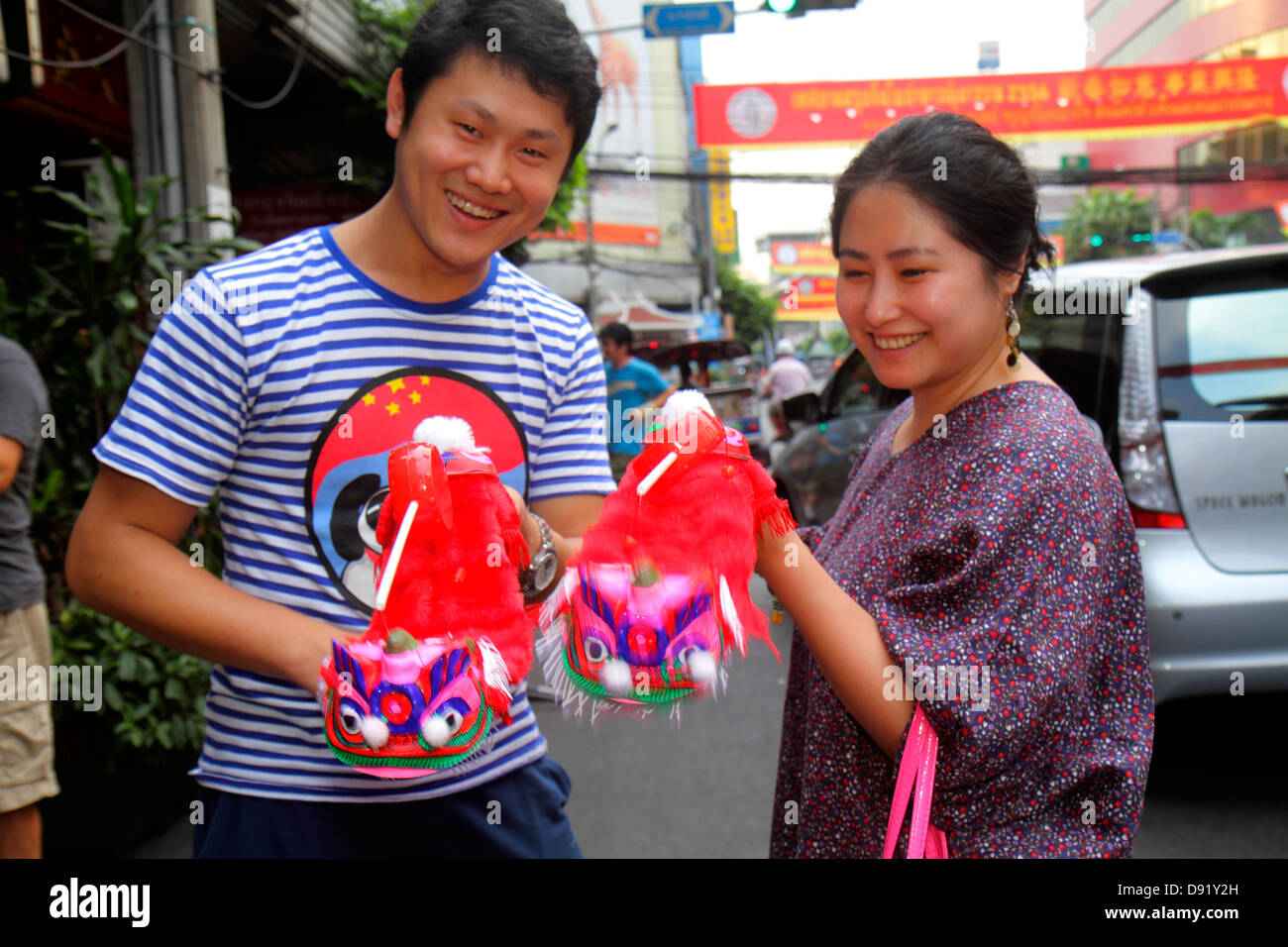 Bangkok Thailand,Thai,Samphanthawong,Chinatown,Yaowarat Road,Chinese New Year,dragon,toy,Asian Asians ethnic immigrant immigrants minority,adult adult Stock Photo
