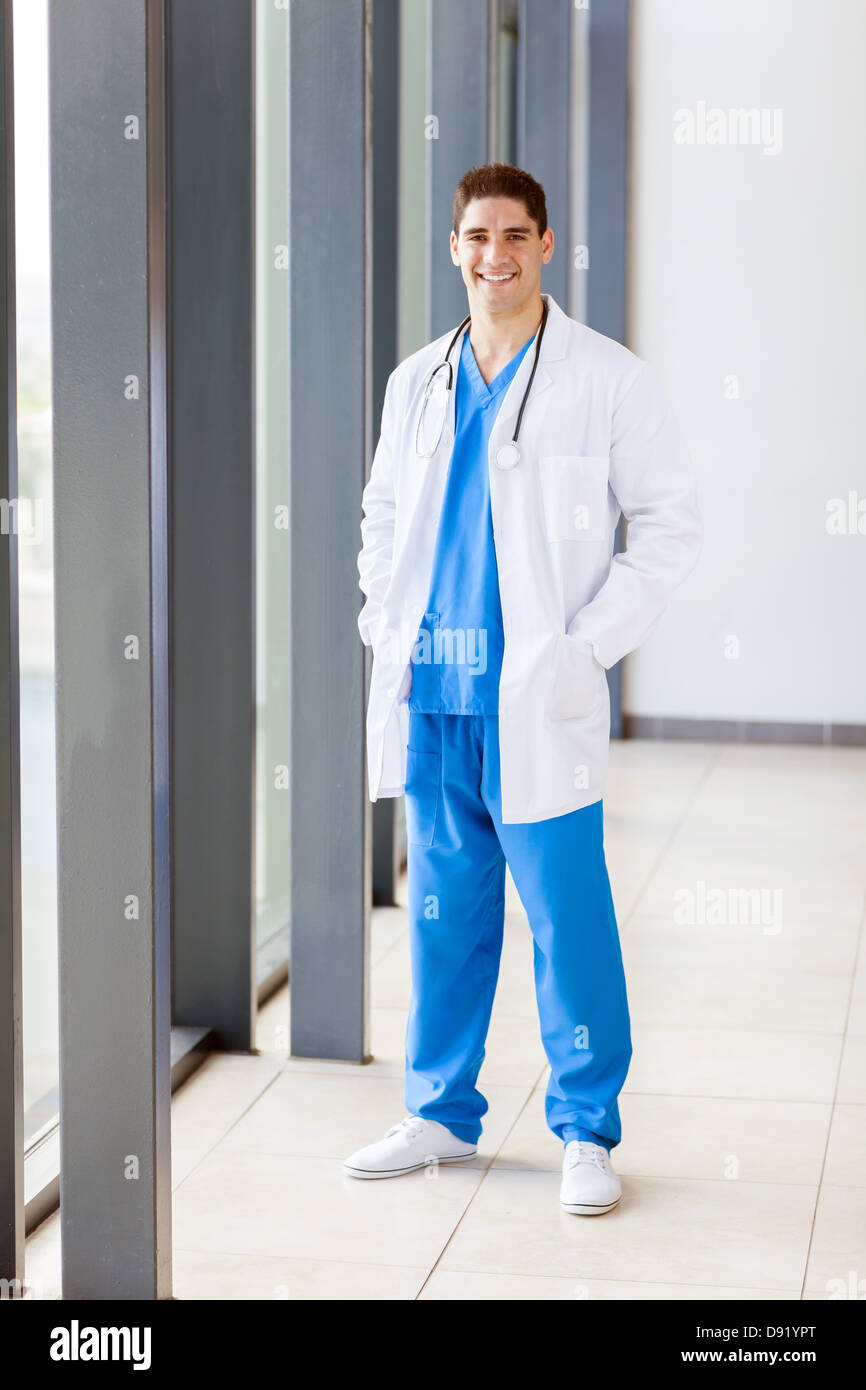male hospital worker in scrubs full length portrait Stock Photo