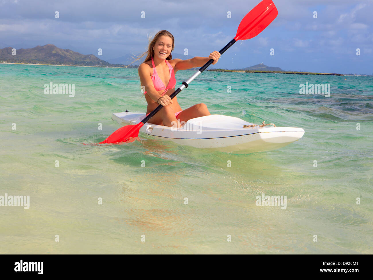 beautiful young woman with her surf ski Stock Photo