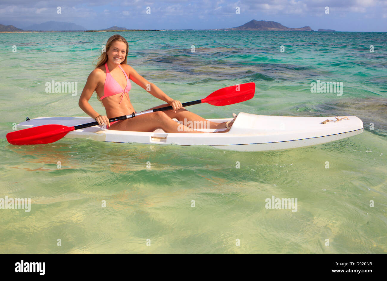 beautiful young woman with her surf ski Stock Photo