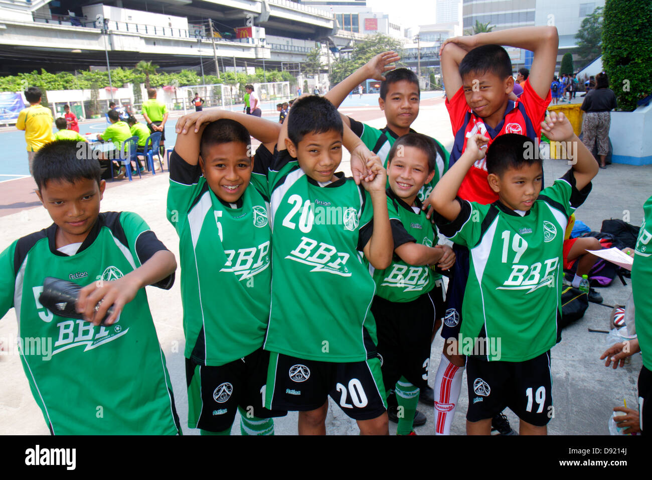 Bangkok Thailand,Thai,Pathum Wan,Rama 1 Road,National Stadium,soccer footbal futbol,Asian boy boys male kids children student students team,teammates, Stock Photo