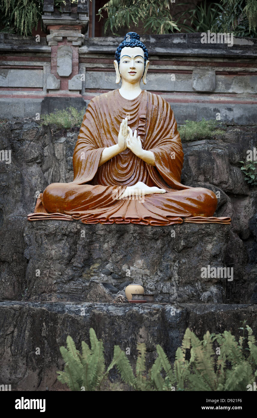 Young Buddha statue in the old park outdoor Stock Photo Alamy
