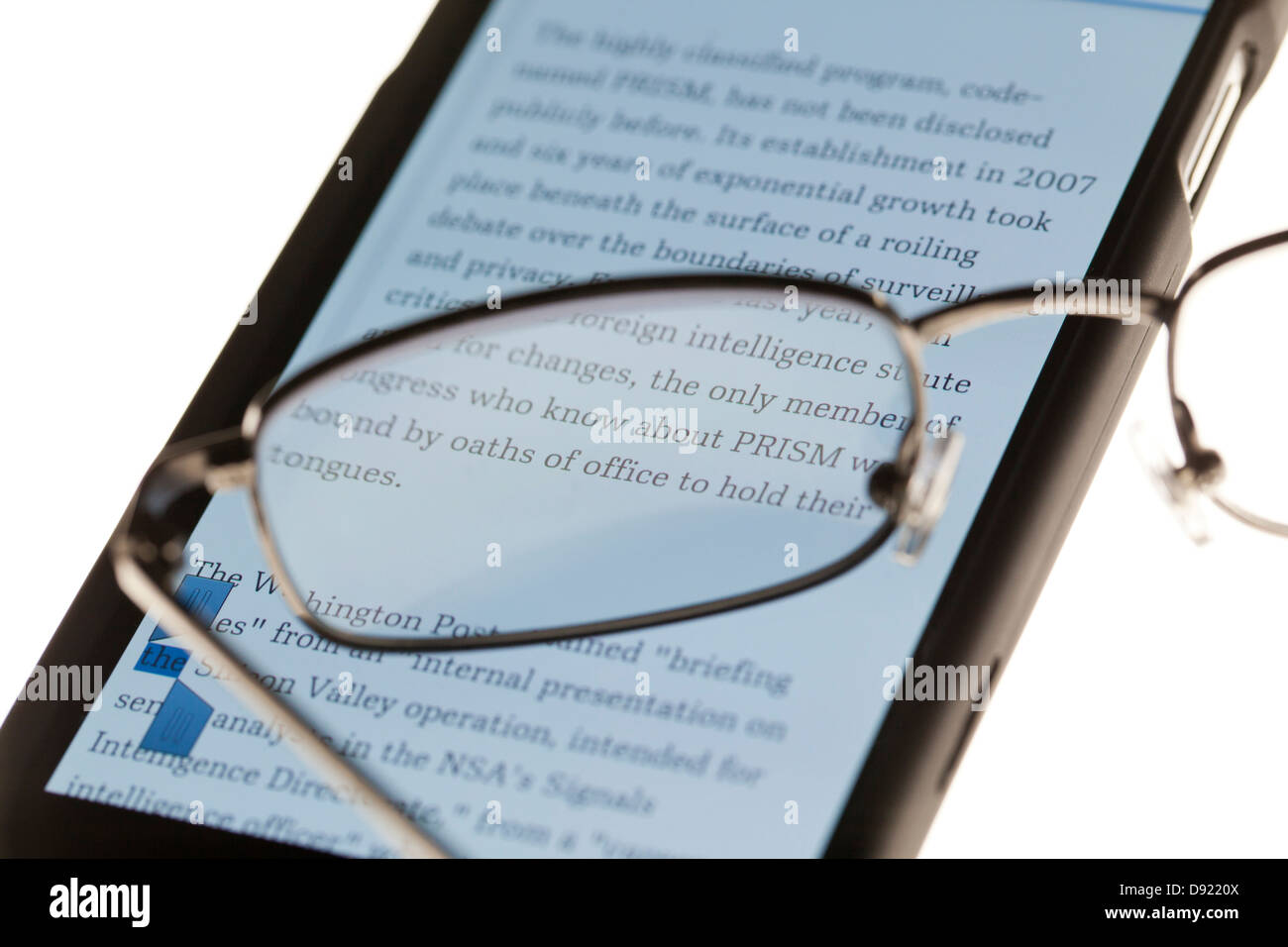 Reading glasses on smart phone Stock Photo