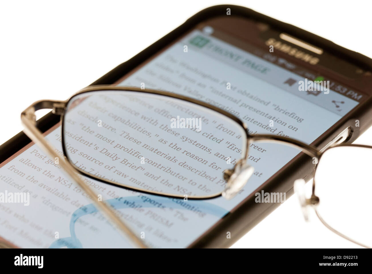 Reading glasses on smart phone Stock Photo
