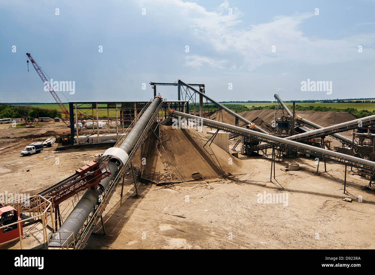 Conveyor belts with piles of gravel Stock Photo Alamy