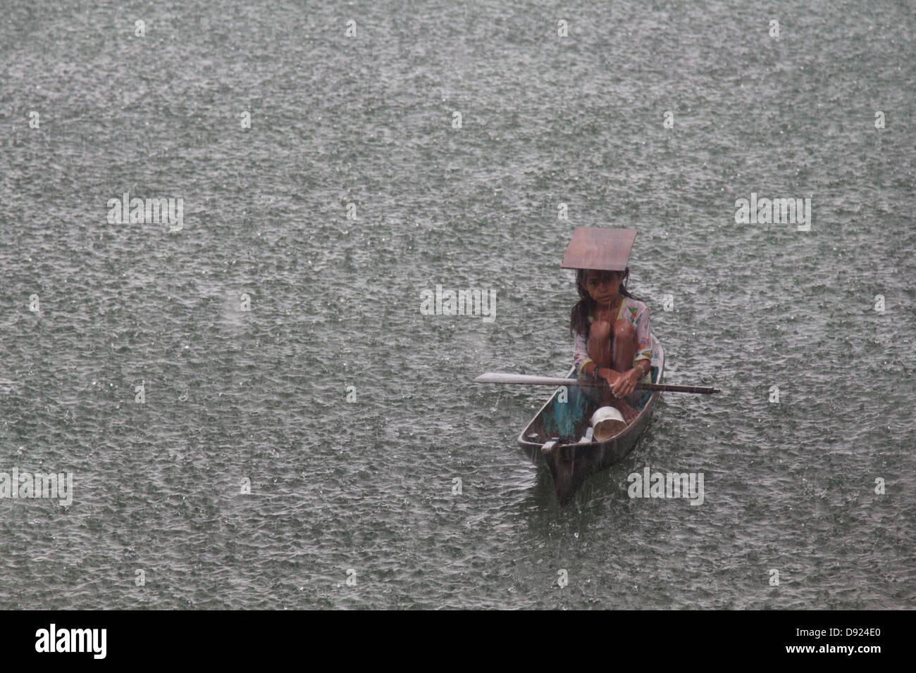 young girl in a canoe Stock Photo