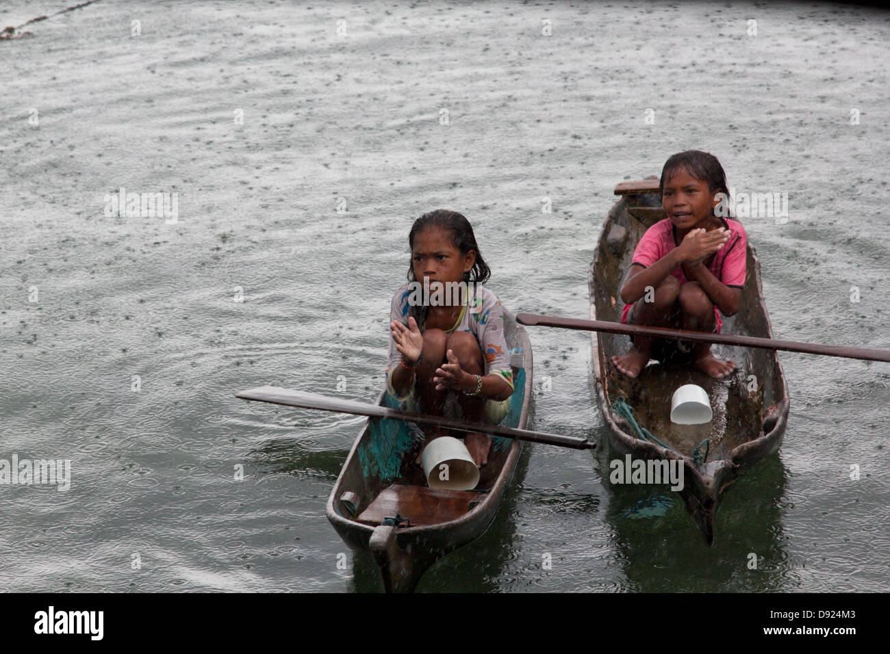 two girls on a canoe Stock Photo - Alamy