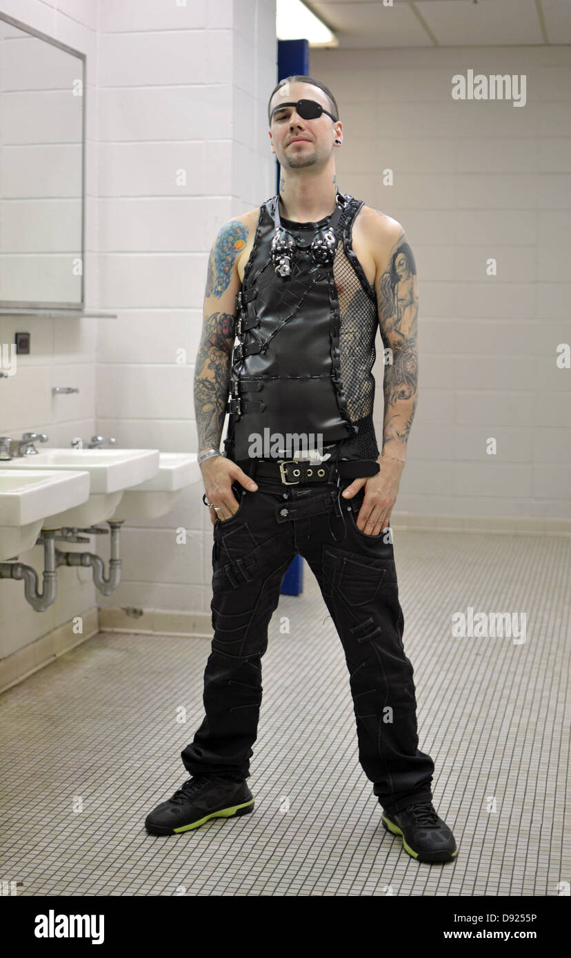 Portrait of Alex in the men's room at the New York Tattoo Festival in Uniondale, Long Island, New York Stock Photo