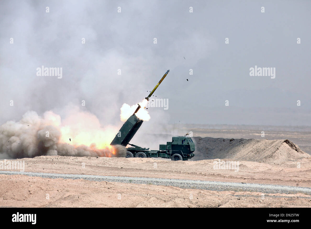 US Marines fire rockets from a M142 High Mobility Artillery Rocket ...