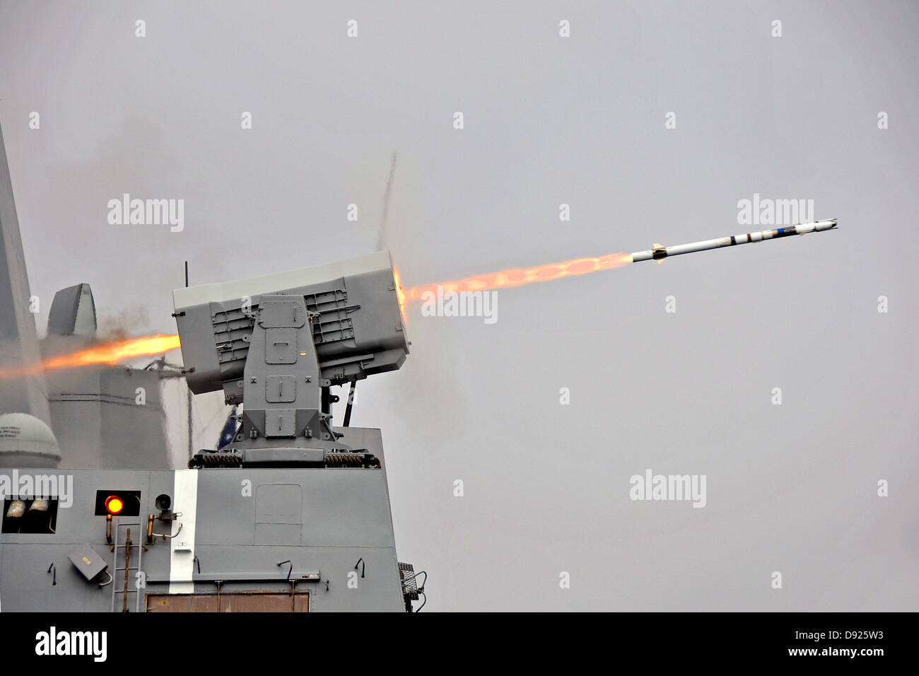 The USS New Orleans fires a surface to air intercept missile from a Rolling Airframe Missile launcher during a live-fire exercise May 21, 2013 off the coast of California. Stock Photo