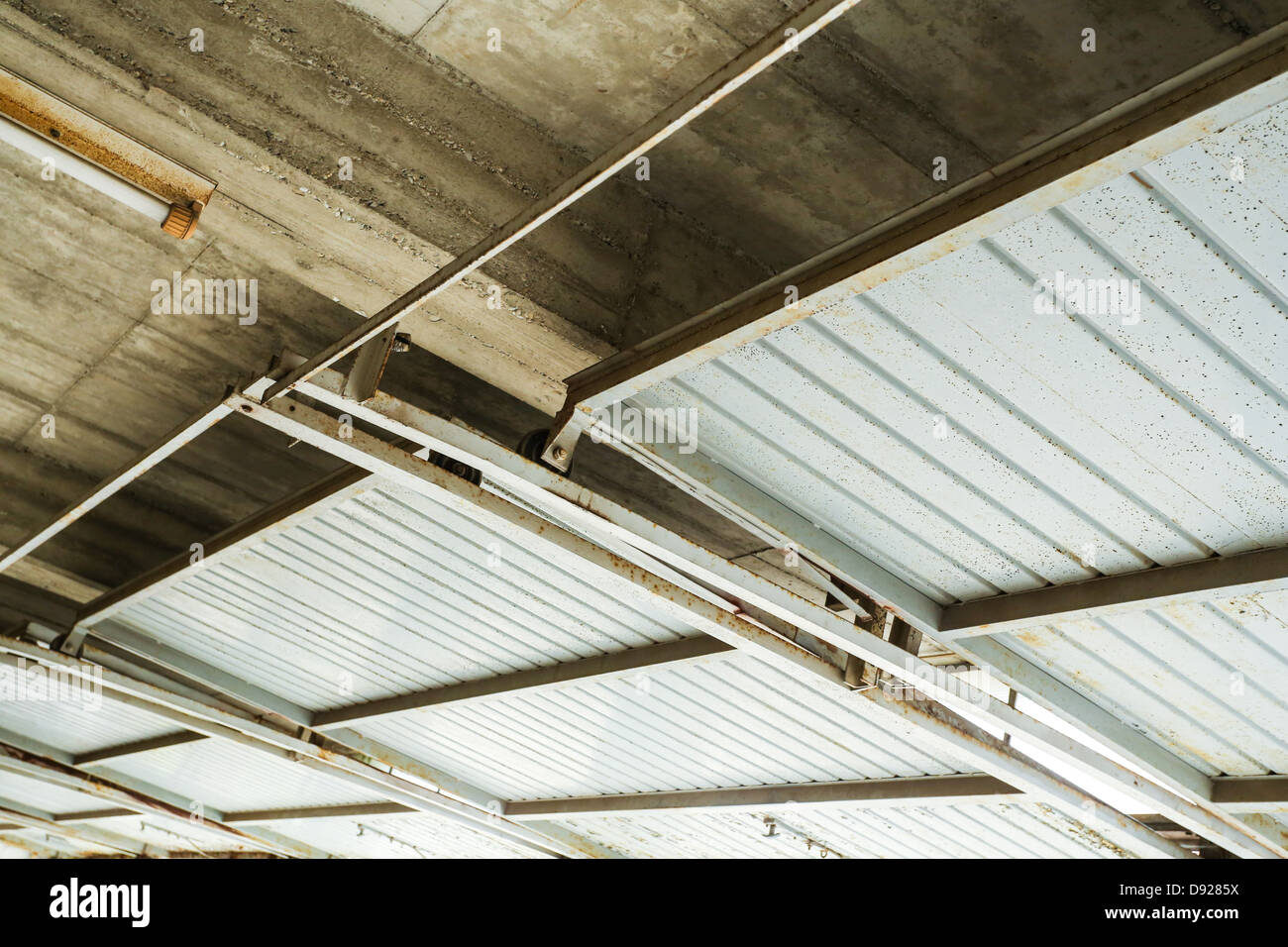 A Industrial Garage Ceiling With Open Gates Stock Photo 57213350