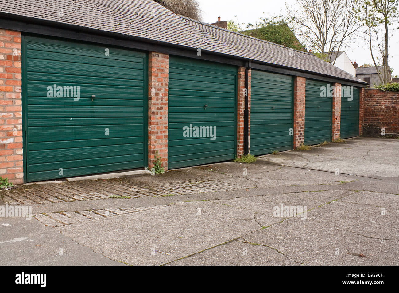 Residential garage block available to rent or lease often used for storage Stock Photo