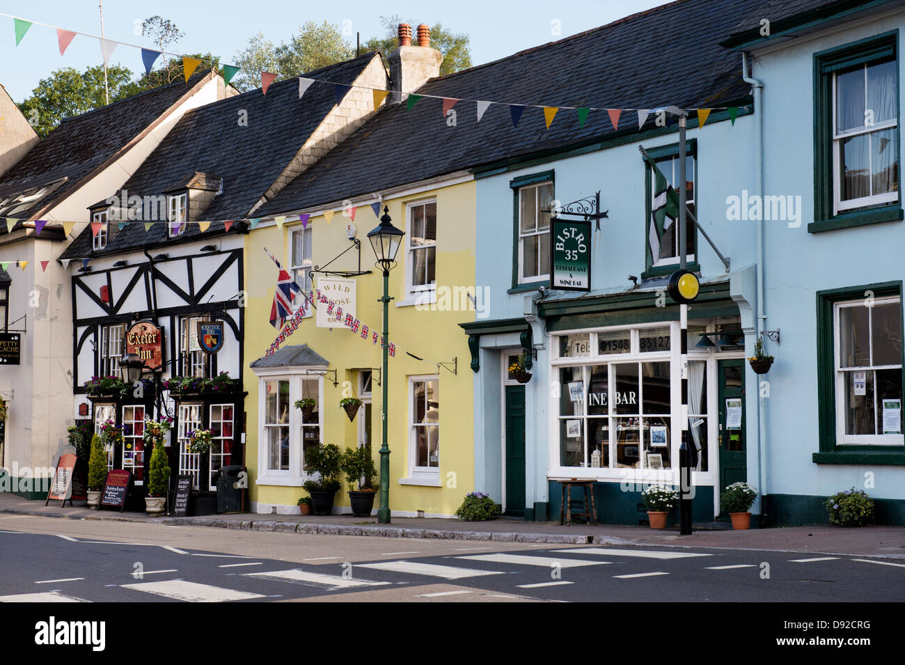 Modbury high Street with flags and bunting. Devon, England Stock Photo