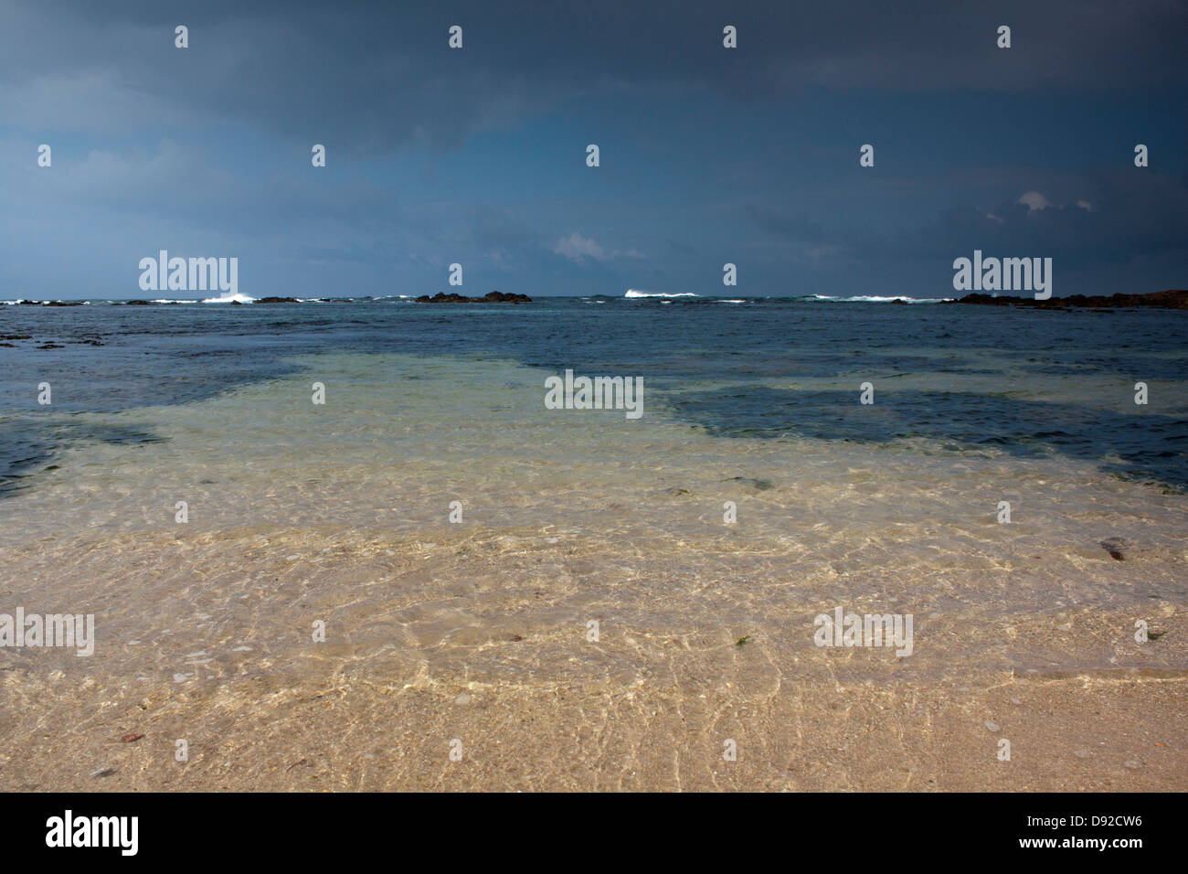 Beach view inside clear crystal water Stock Photo Alamy