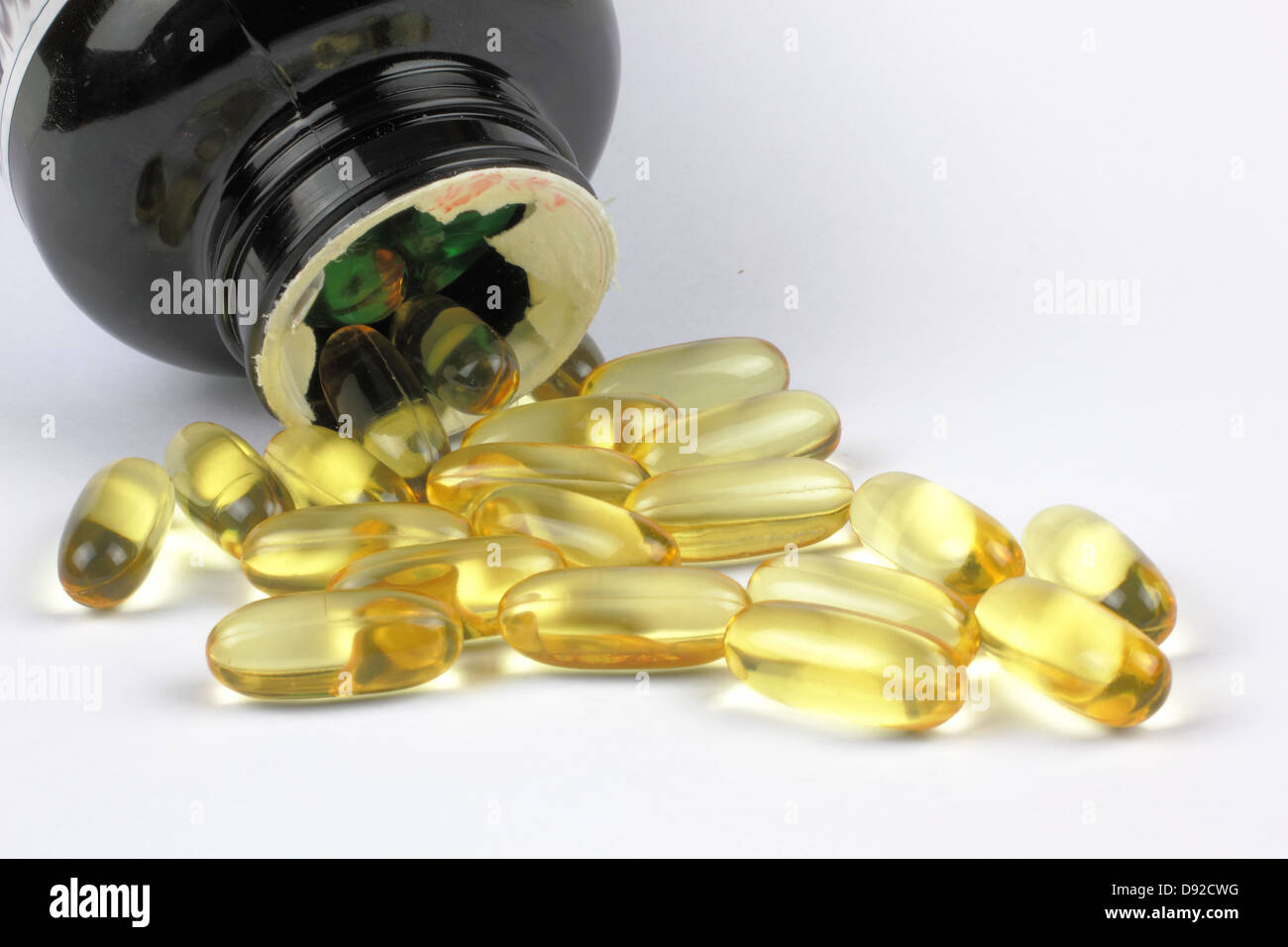 fish oil on the white backgrond Omega b Stock Photo