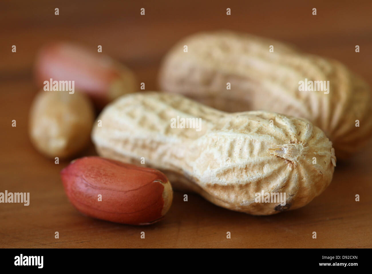 Peanuts with and without shell, close up Stock Photo Alamy