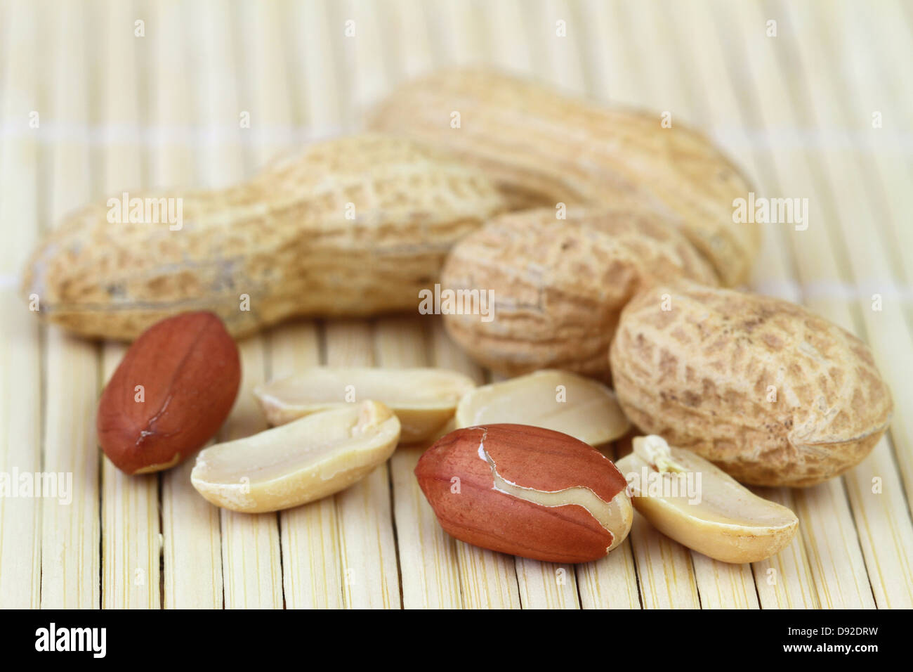 Peanuts with and without shell, close up Stock Photo Alamy