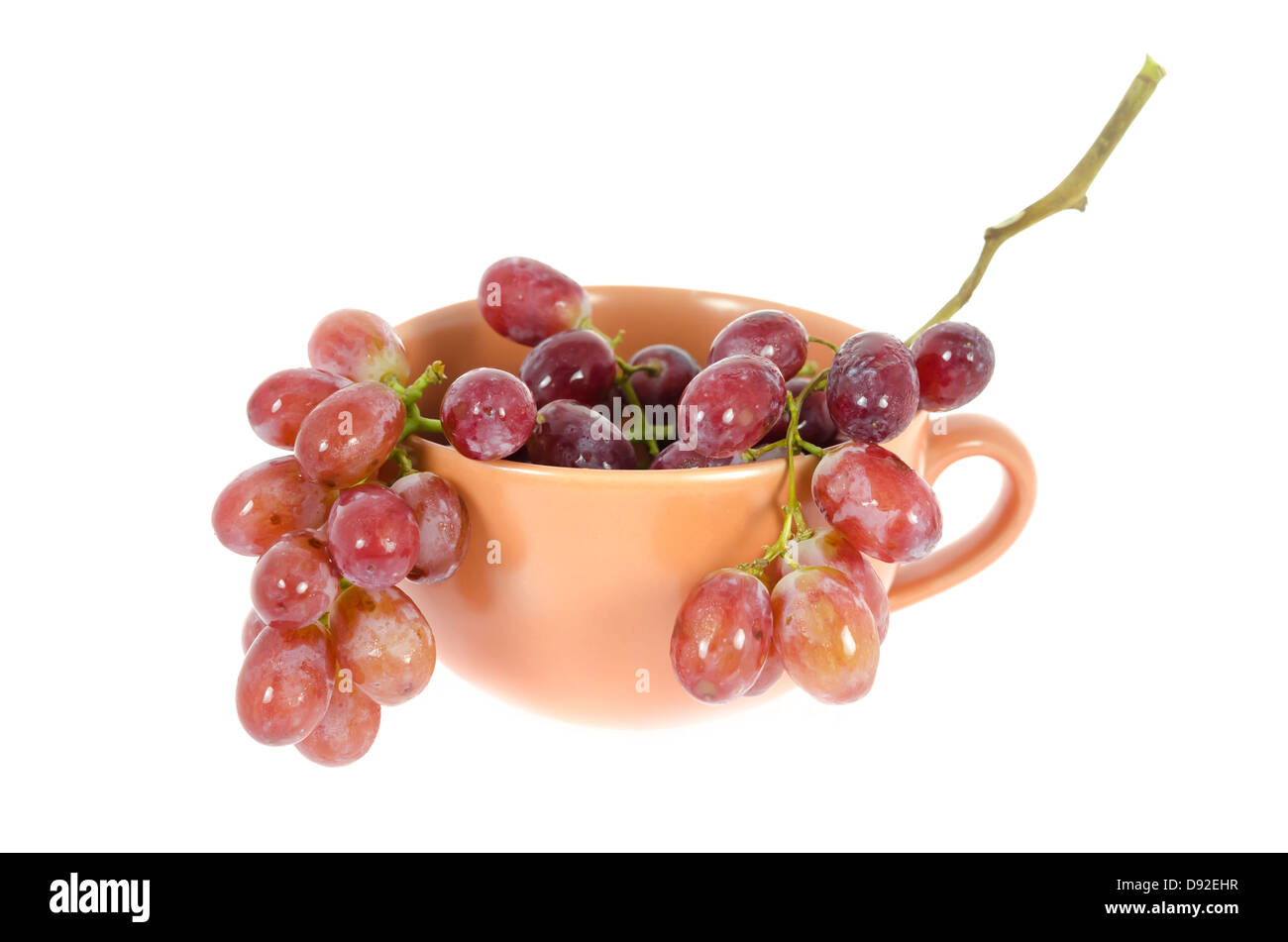 fresh grape fruits in cup over white background Stock Photo Alamy