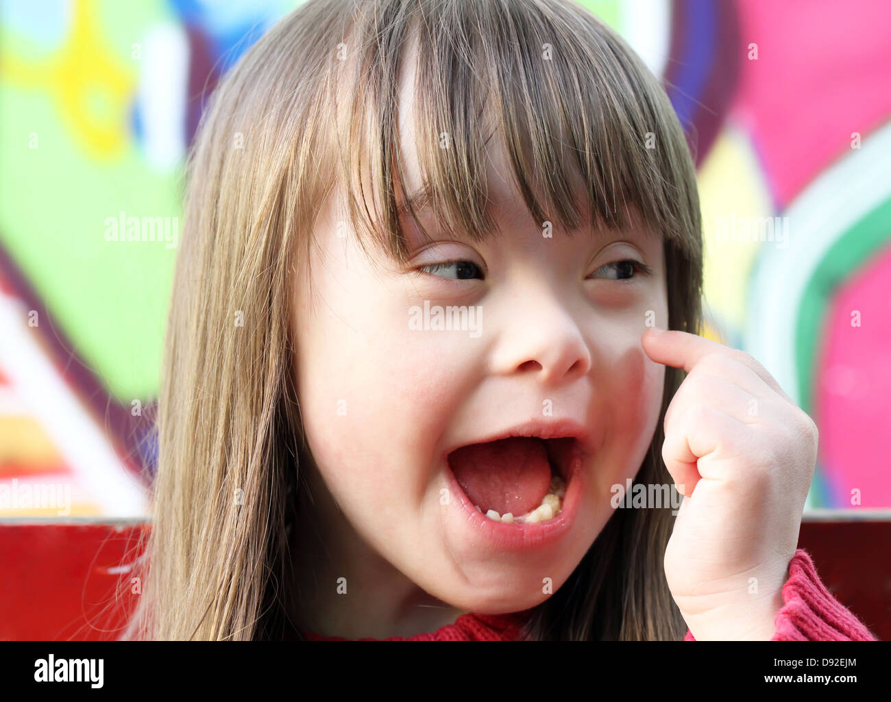 Portrait of beautiful young girl on the playground Stock Photo - Alamy