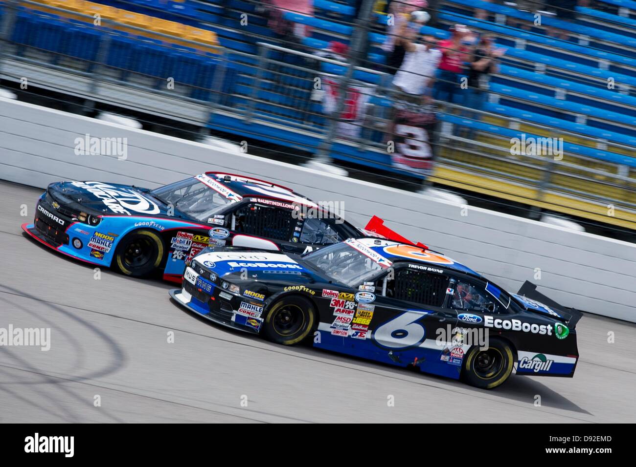 Newton, IA, USA. 9th June, 2013. Trevor Bayne (6) passes Austin Dillon (3) during the Pioneer Hi-Bred 250 at the Iowa Speedway in Newton, IA. Credit:  Cal Sport Media/Alamy Live News Stock Photo