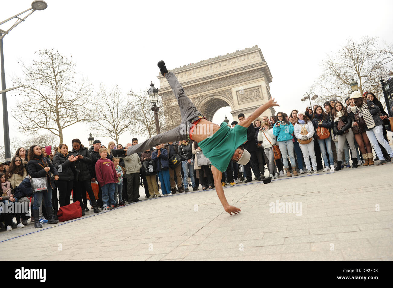 Break dancer entertaining crowd on the street Paris France. Picture by Sam Bagnall Stock Photo