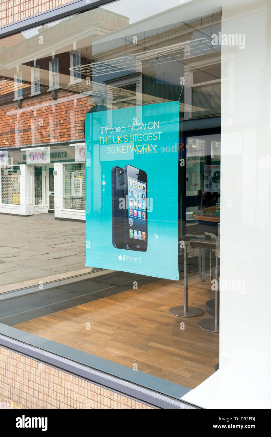 iPhone 5 advertising poster in shop window Stock Photo