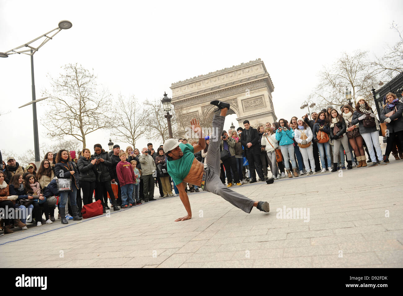 Break dancer entertaining crowd on the street Paris France. Picture by Sam Bagnall Stock Photo