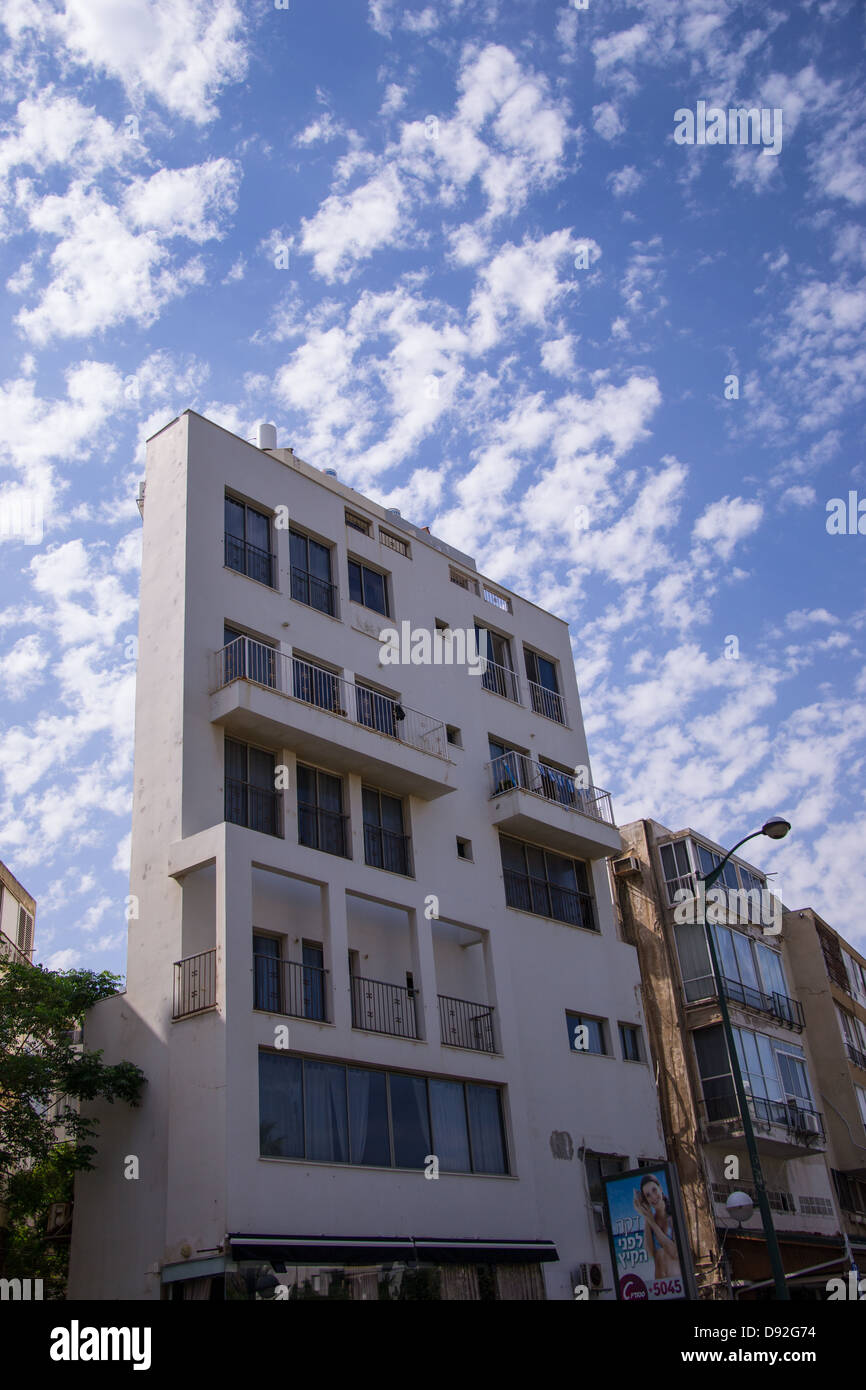New and old buildings against blue sky Stock Photo - Alamy