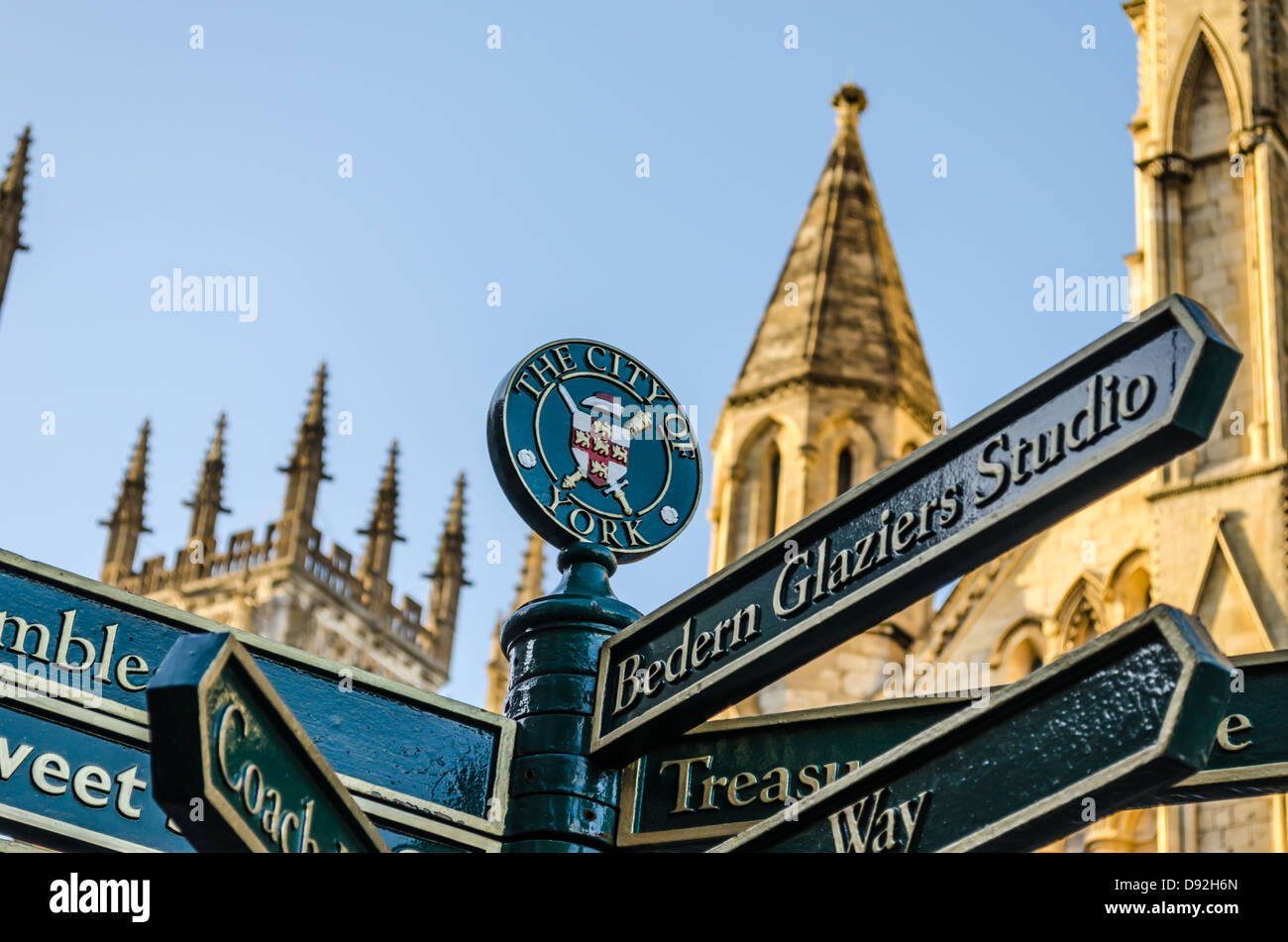 Directional signpost outside York Minster. York, North Yorkshire, England. Stock Photo