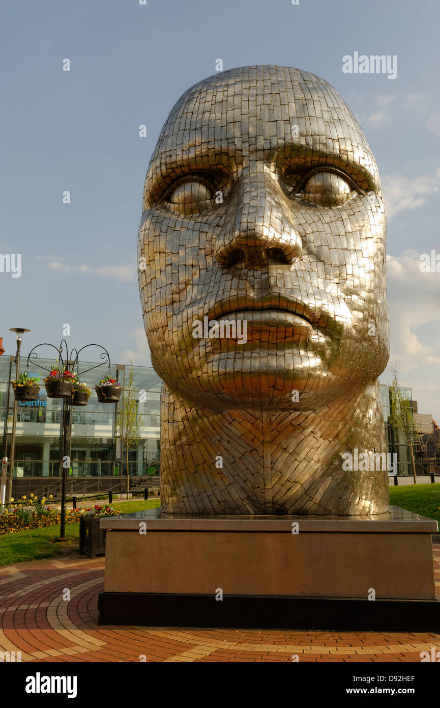 The Face of Wigan - modern sculpture statue by Rick Kirby in 2008 erected in the Wigan town centre. Stock Photo
