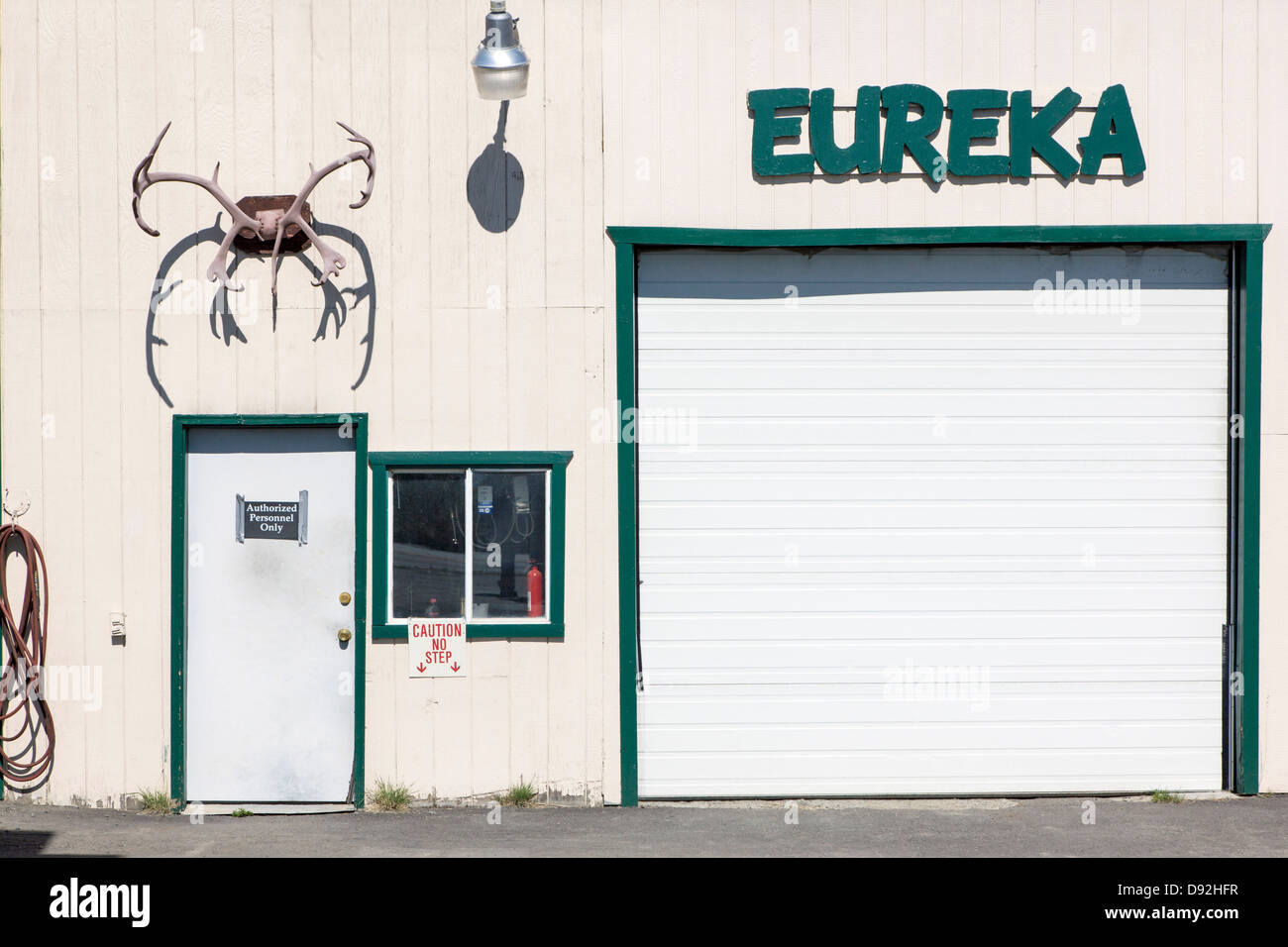 Eureka Lodge, roadhouse and restaurant.  Caribou antlers adorn an out building. Stock Photo