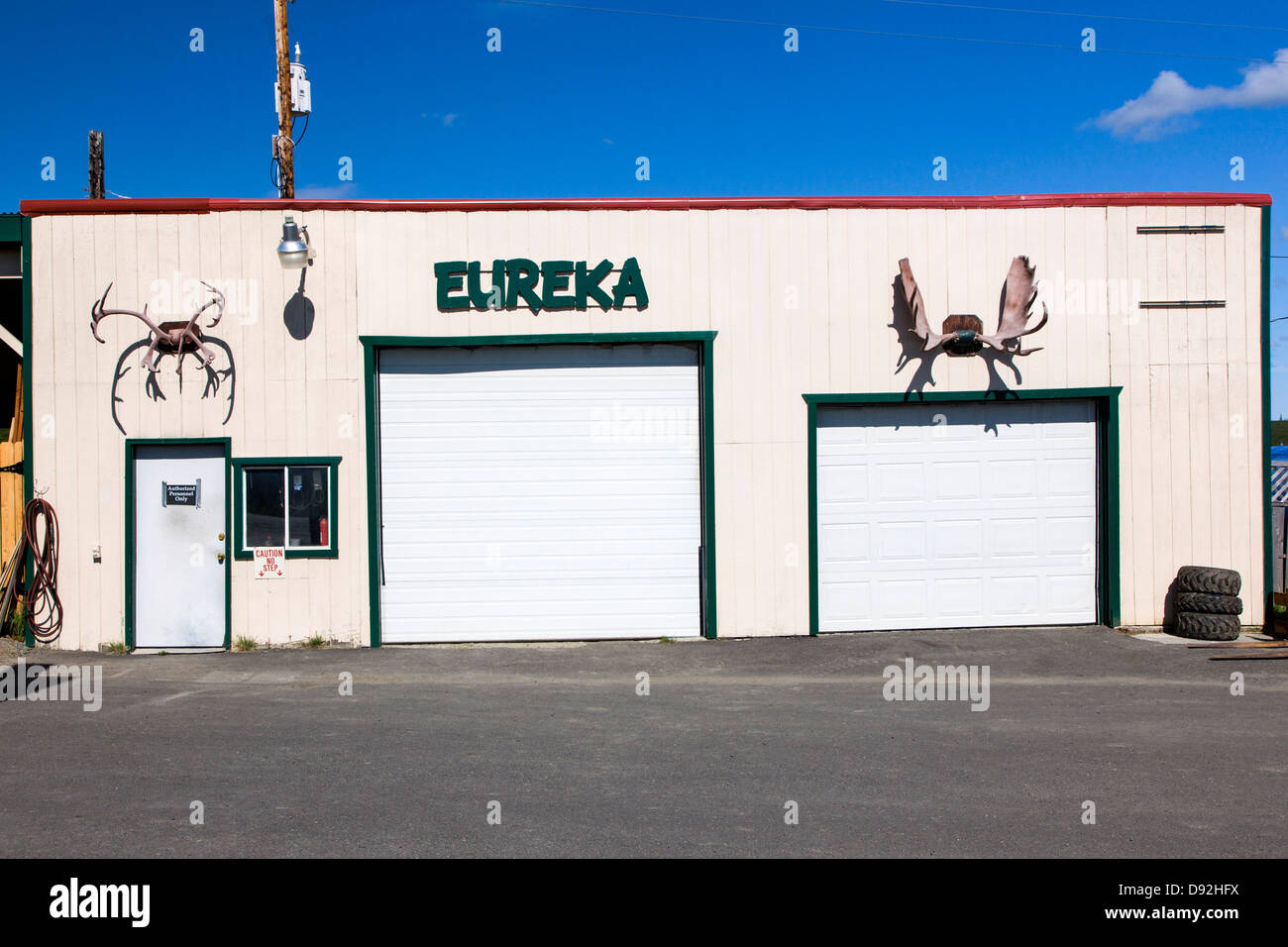 Eureka Lodge, roadhouse and restaurant.  Caribou antlers adorn an out building. Stock Photo