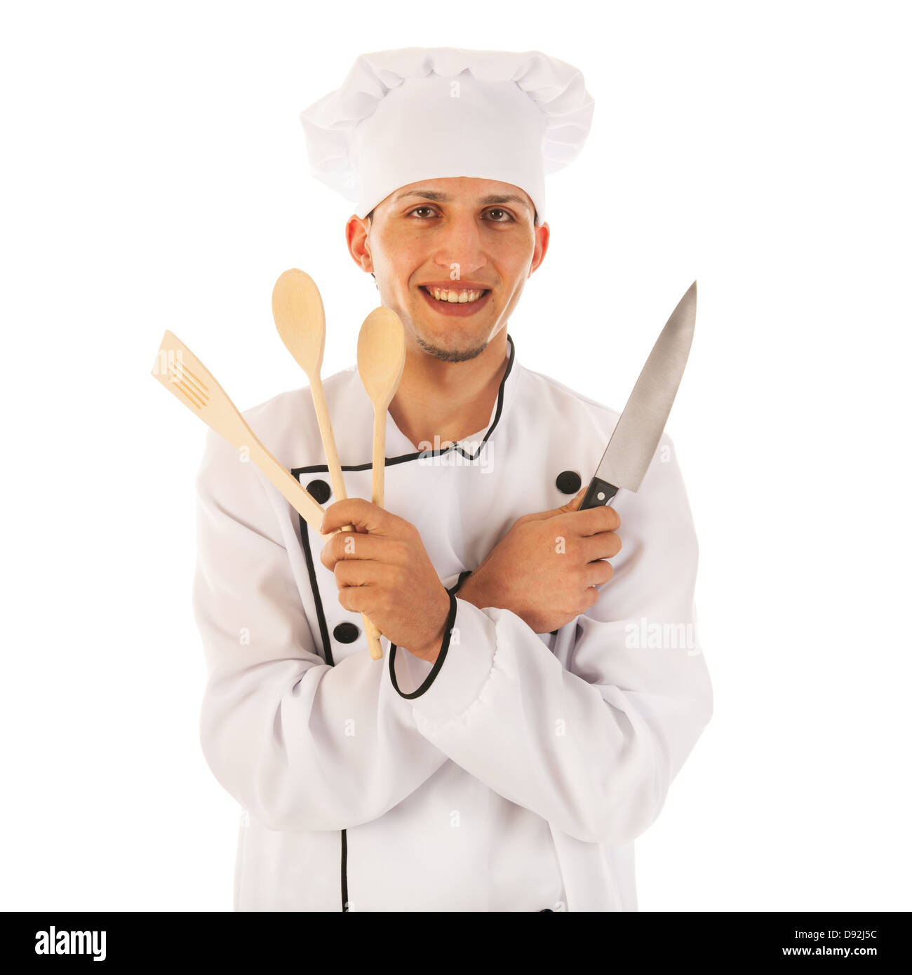 Cook with kitchen utensil as wooden spoons and knife Stock Photo Alamy