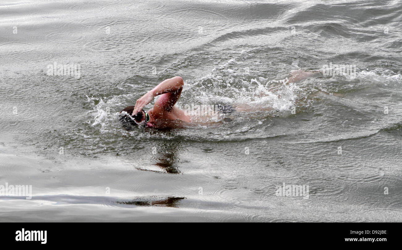 NEW YORK CITY, USA. 8 June, 2013. Australian swimming coach Paul Newsome strokes his way to the finish to win the 45km Manhattan Island Marathon swim. Credit:  Trevor Collens/Alamy Live News Stock Photo