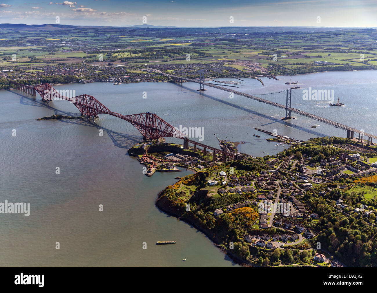Aerial view of the Forth Rail & Road Bridges, construction of new crossing and North/South Queensferry in Scotland Stock Photo