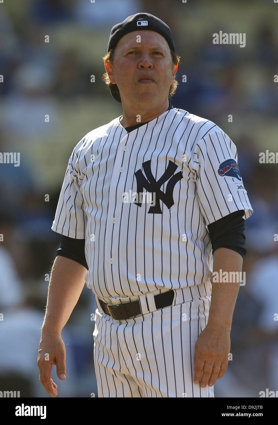 LOS ANGELES, CA - JUNE 08: Actor Billy Crystal plays for the New York Yankees against the Los Angeles Dodgers in an Old Timers Stock Photo