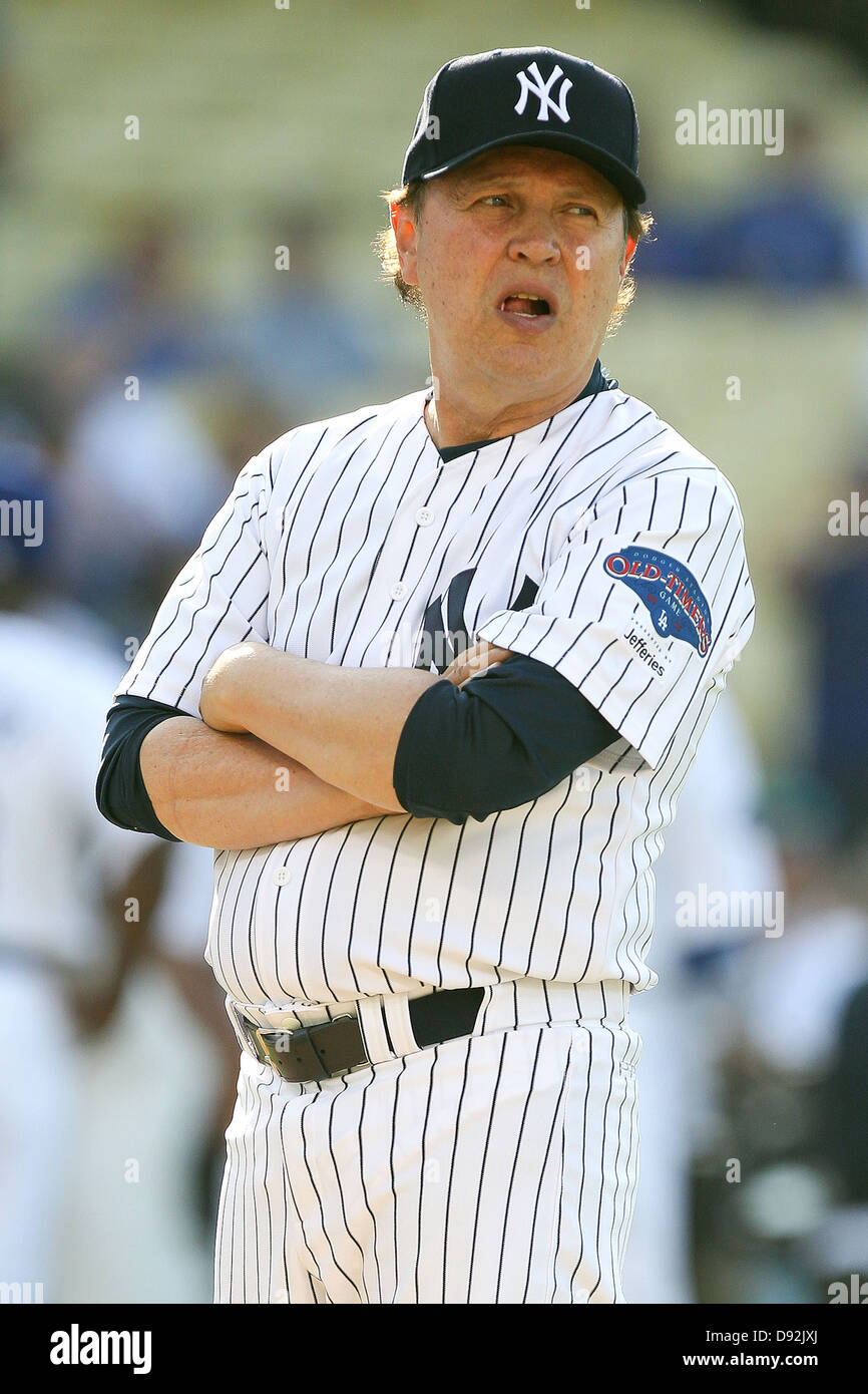 LOS ANGELES, CA - JUNE 08: Actor Billy Crystal plays for the New York Yankees against the Los Angeles Dodgers in an Old Timers Stock Photo